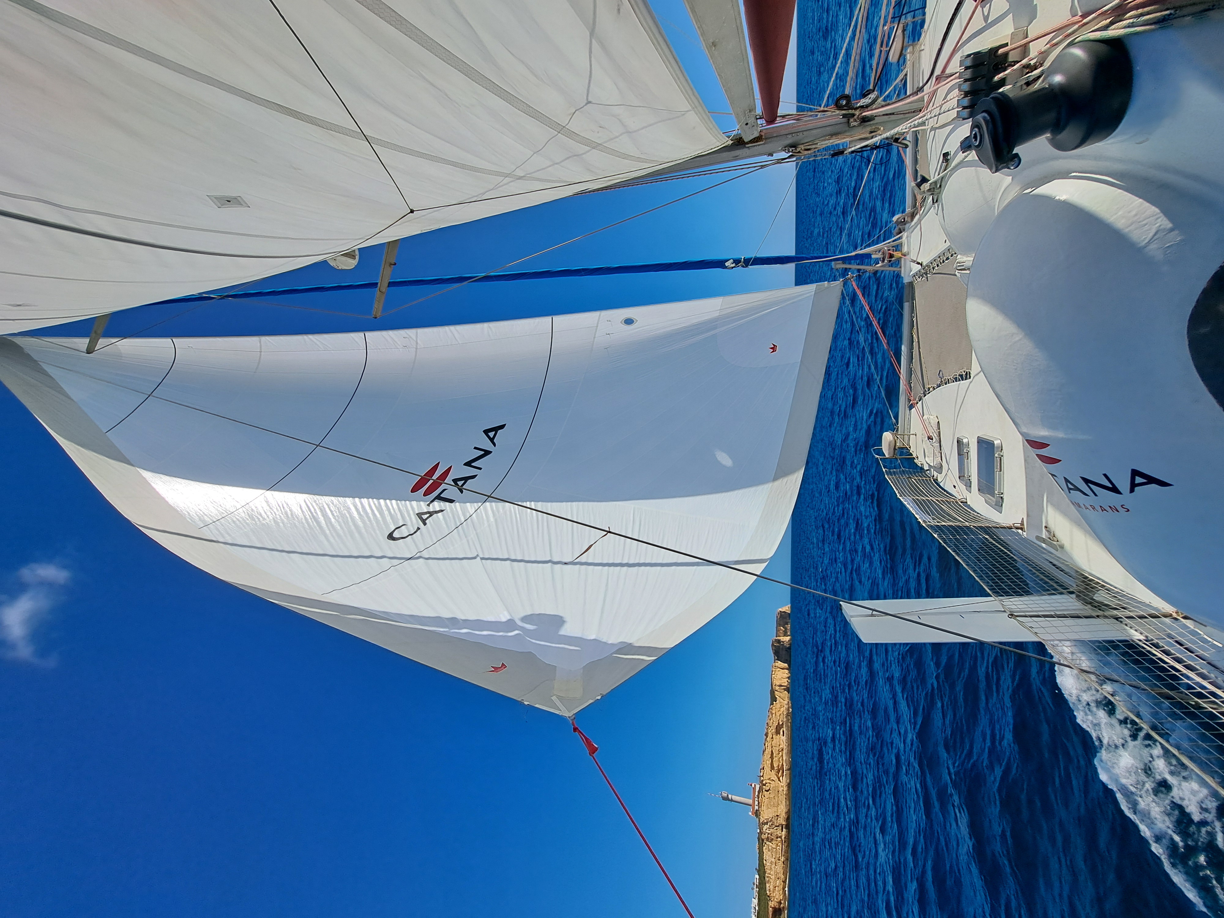 Close-up of CATANA sails during a coastal navigation trip.